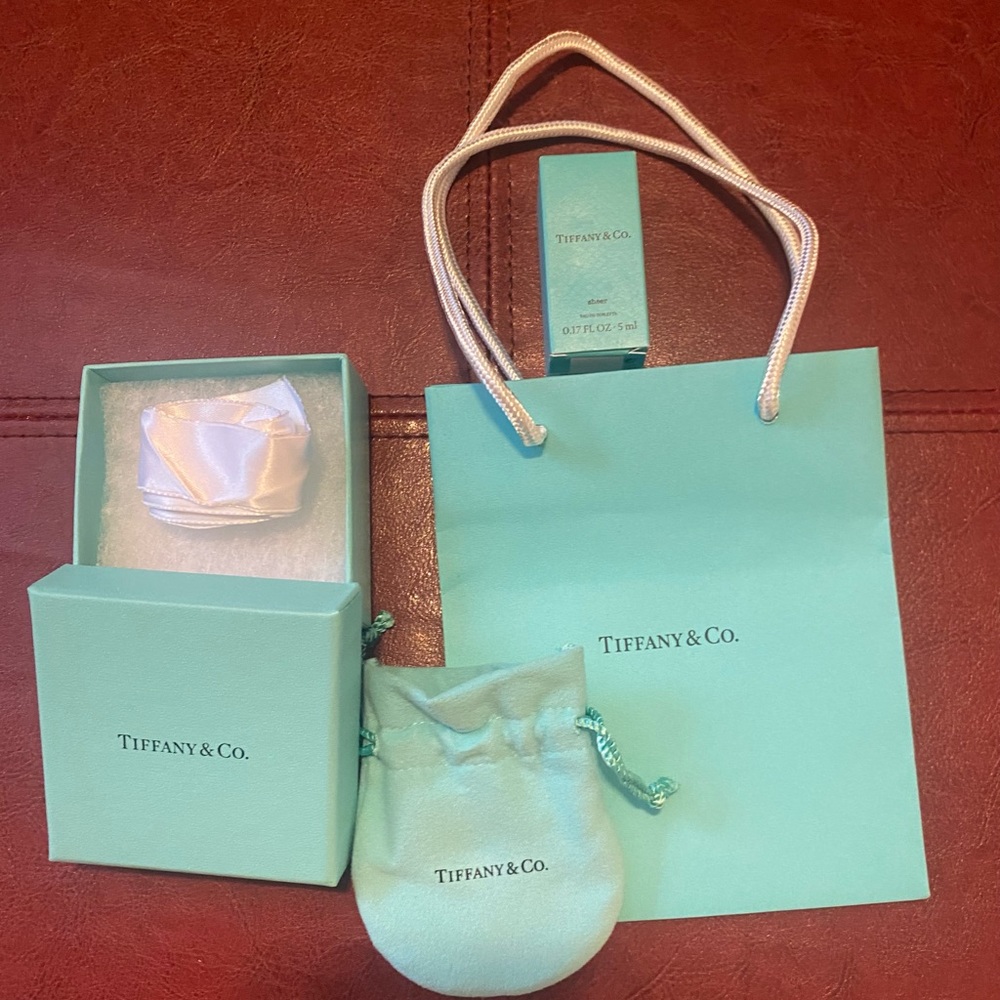 Trade this with Gucci dust bag bundle and Tiffany paper bag bundle